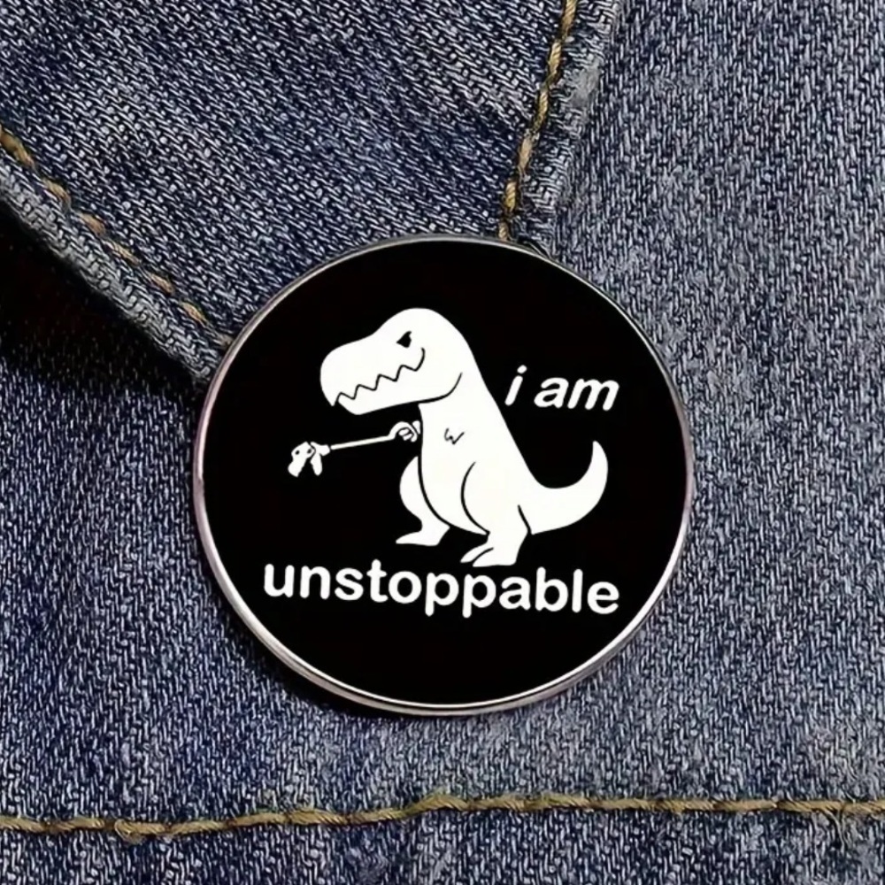 3/$25 “I Am Unstoppable” inspirational Pin T-Rex holding a Hand Held Grabber